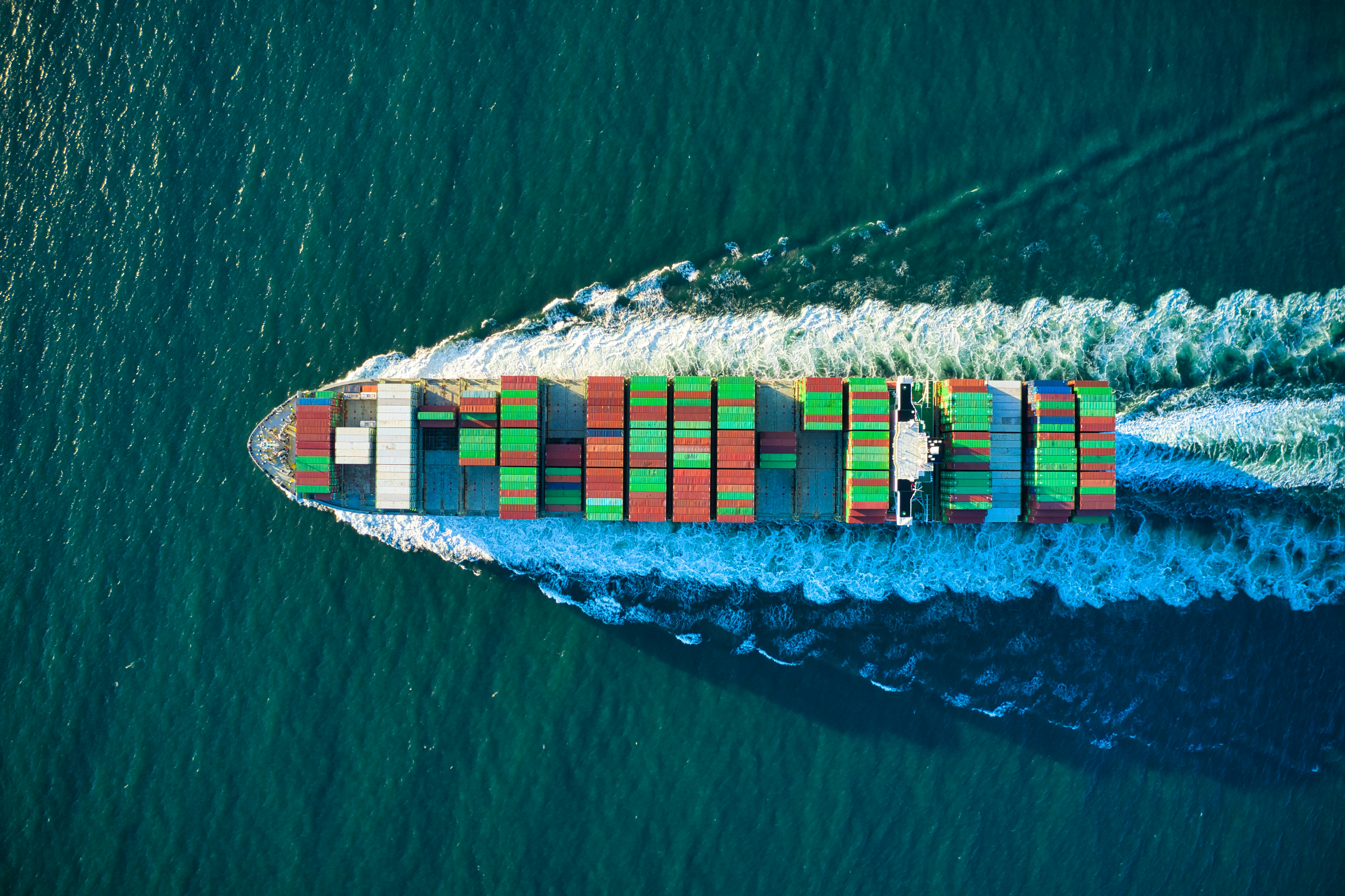 Aerial view of shipping containers at port terminal